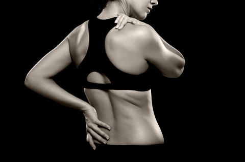 http://www.dreamstime.com/stock-photos-woman-lower-back-shoulder-pain-black-white-photo-athletic-holding-her-as-if-experiencing-photographed-image31881793